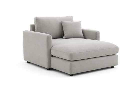Canapé méridienne en tissu gris avec coussin décoratif
